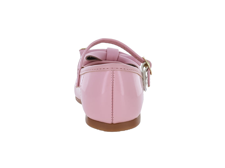 Zapato plano rosa brillante para niña con moño decorativo y correa con hebilla dorada.