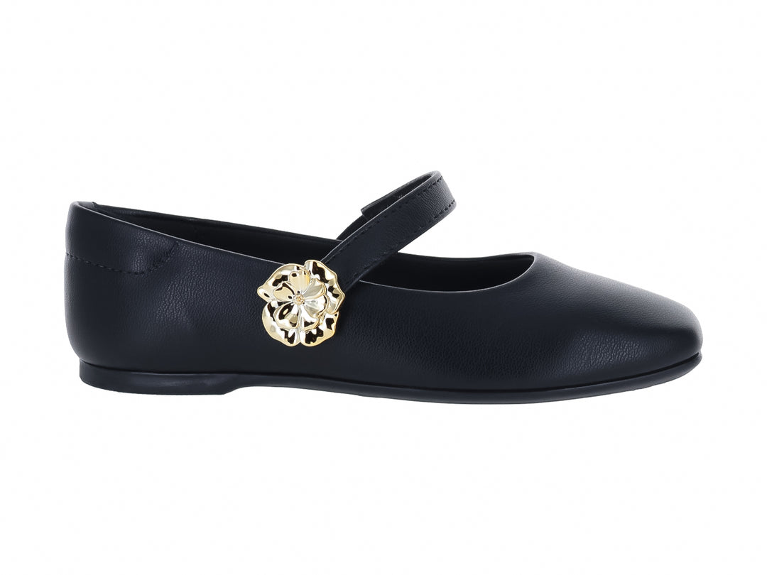 Zapato plano negro para Niña con correa y detalle floral dorado.