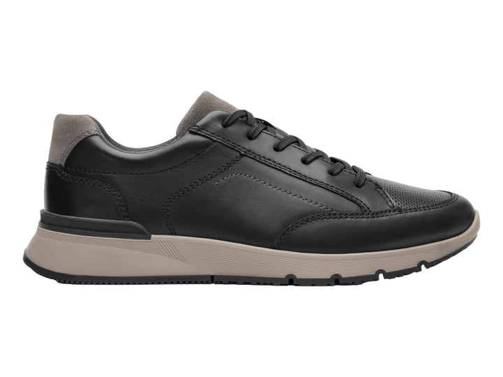 Zapato casual Flexi color negro con suela beige y detalles en gris.