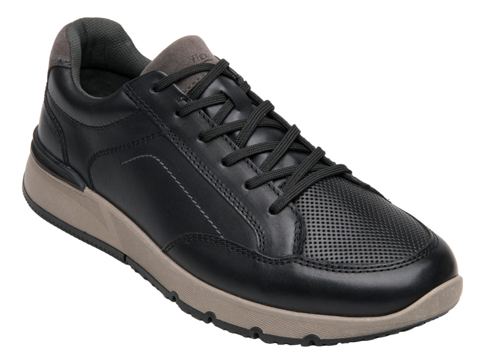 Zapato casual Flexi color negro con suela beige y detalles en gris.