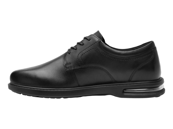 Zapato formal negro de cuero con cordones y amortiguación visible en la suela.