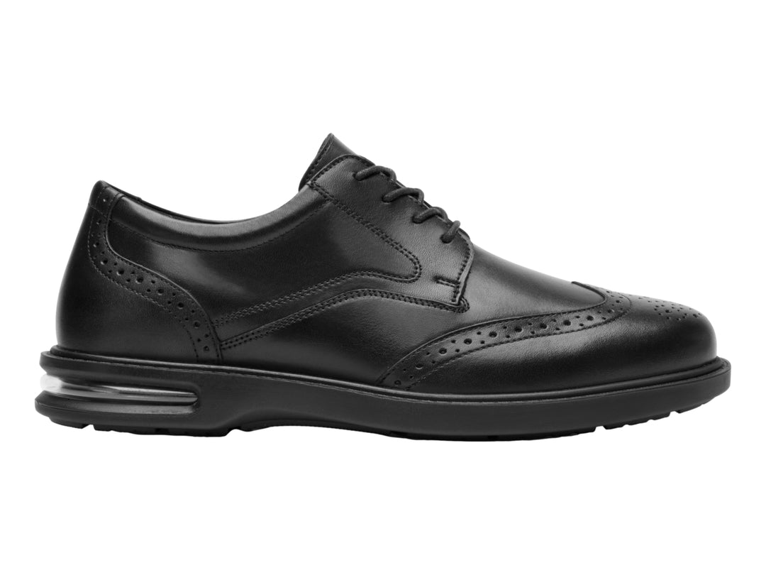 Zapato casual Flexi color negro para hombre con agujetas y detalles perforados.