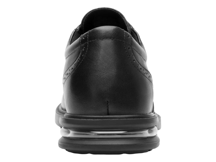 Zapato casual Flexi color negro para hombre con agujetas y detalles perforados.