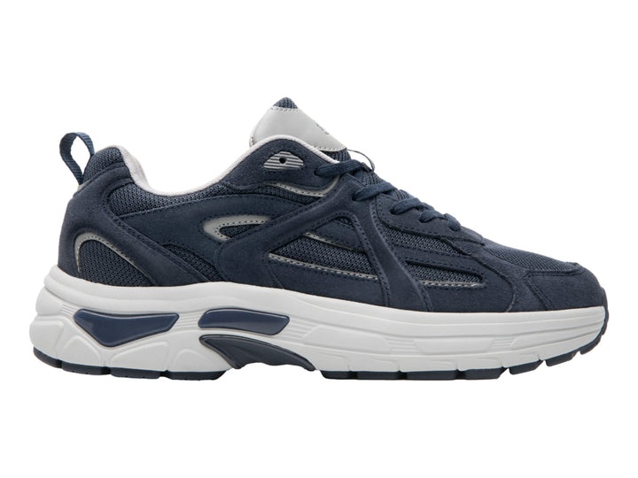 Tenis deportivos Flexi en color azul marino con suela blanca y detalles sintéticos.