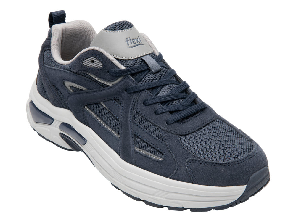 Tenis deportivos Flexi en color azul marino con suela blanca y detalles sintéticos.