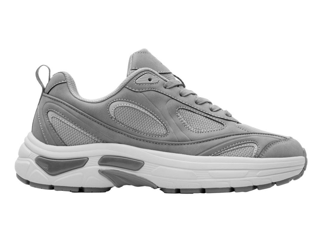Tenis Flexi modelo Gibson en color gris con suela blanca y detalles sintéticos.