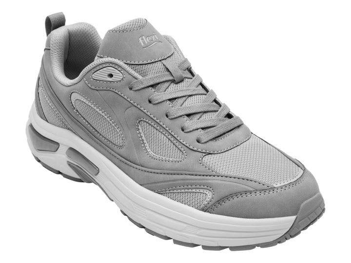 Tenis Flexi modelo Gibson en color gris con suela blanca y detalles sintéticos.