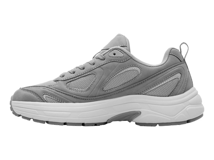 Tenis Flexi modelo Gibson en color gris con suela blanca y detalles sintéticos.