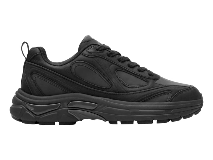 Tenis deportivos Flexi color negro total con suela robusta y diseño ergonómico.