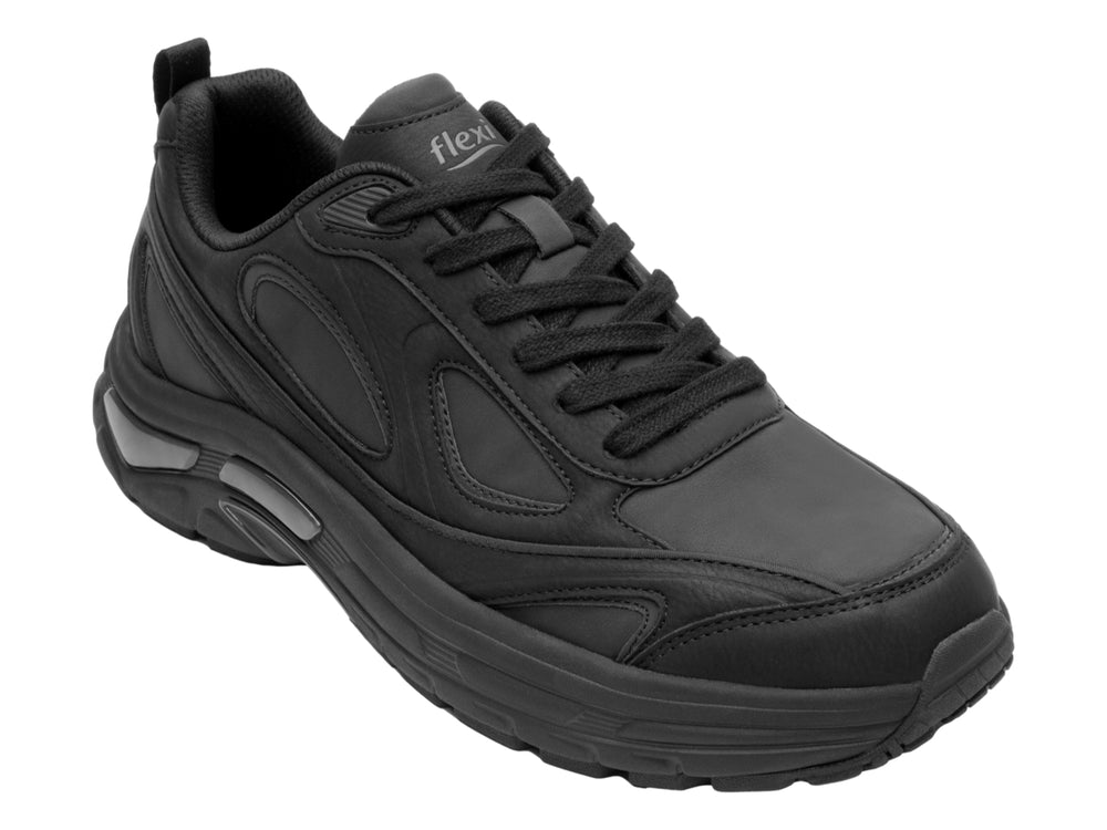 Tenis deportivos Flexi color negro total con suela robusta y diseño ergonómico.