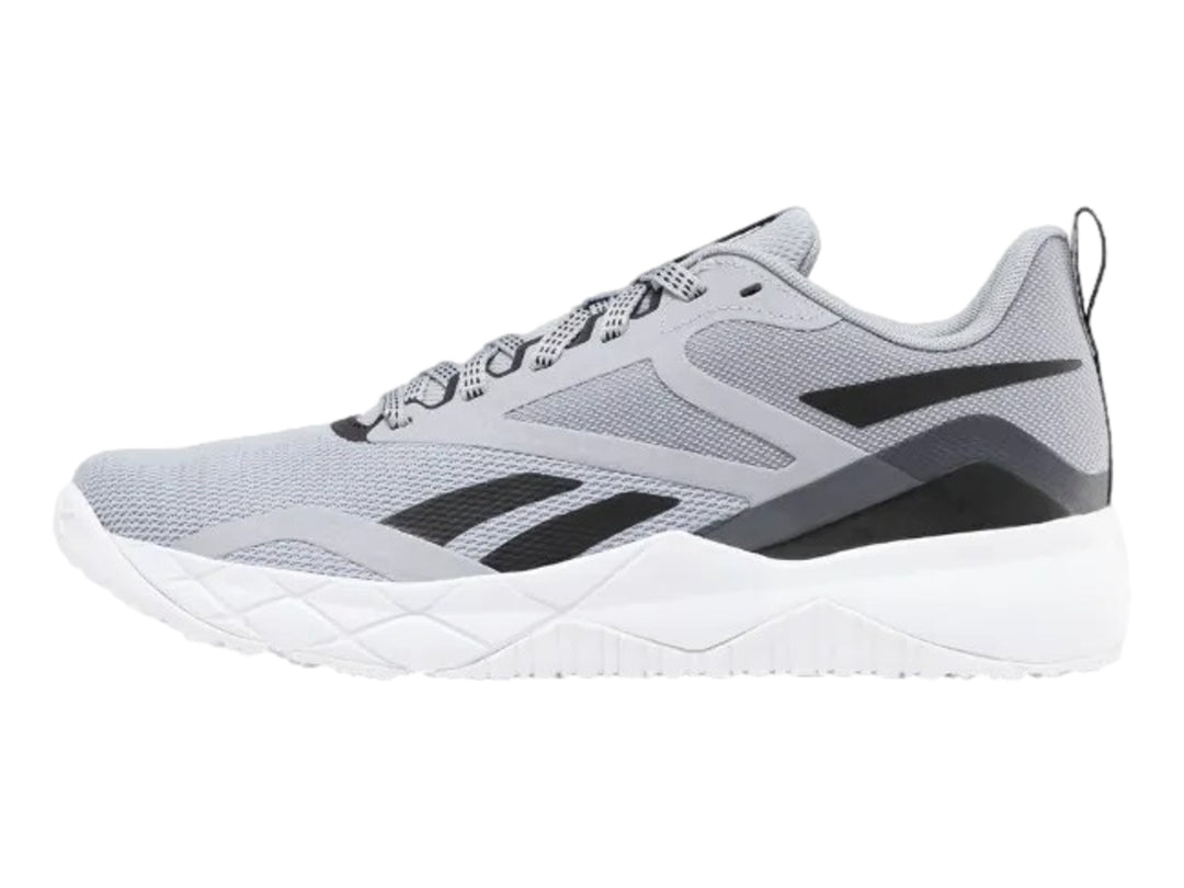 Tenis deportivos Reebok en color gris con detalles negros y suela blanca.