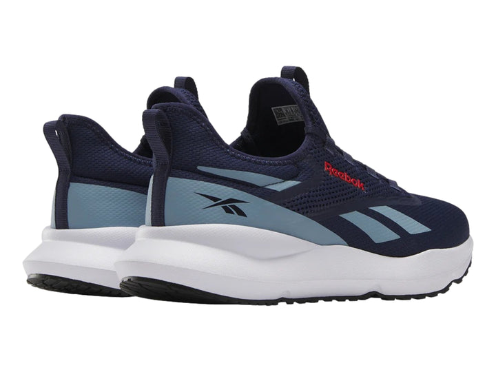Tenis deportivos Reebok color azul marino con suela blanca y detalles en azul claro.