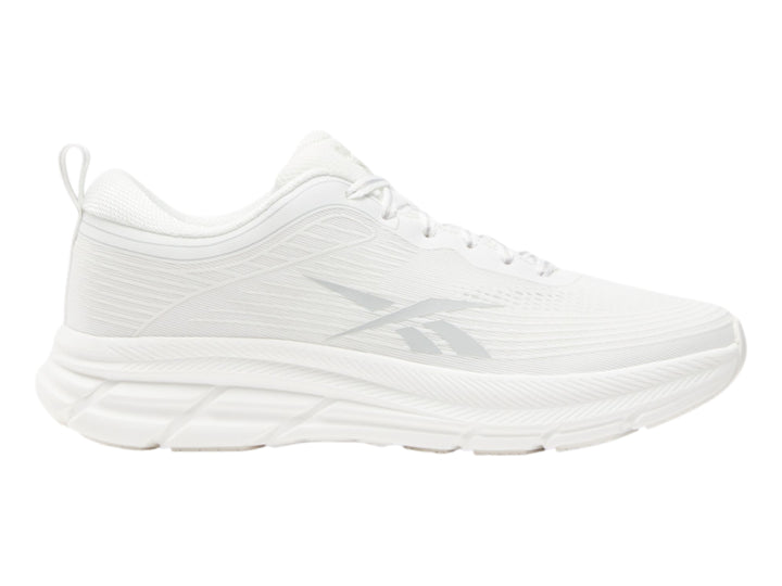Tenis deportivos Reebok color blanco con suela blanca y detalles minimalistas.