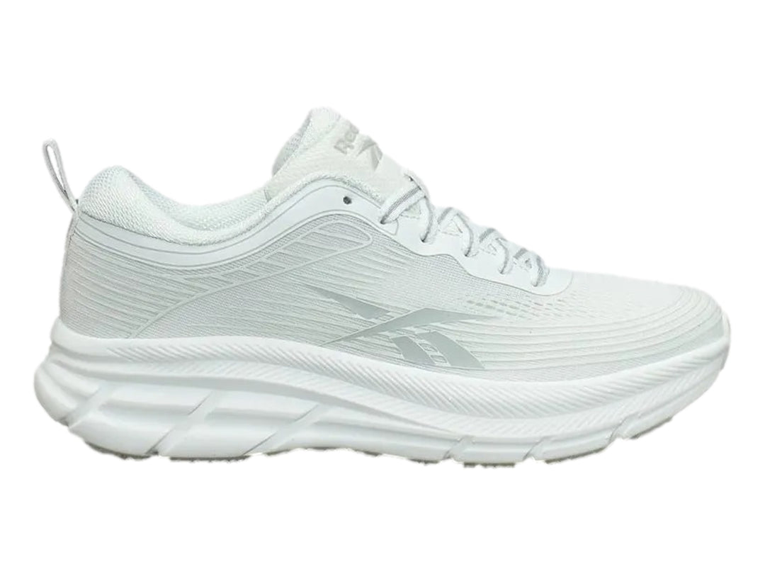 Tenis deportivos Reebok Road Strider color blanco con detalles en gris y suela blanca.