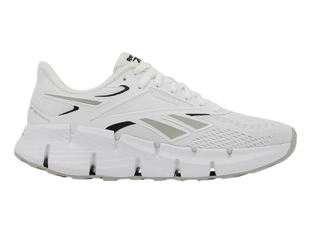 Tenis deportivos Reebok Zig Dynamica 6 en color blanco con detalles en gris y negro.