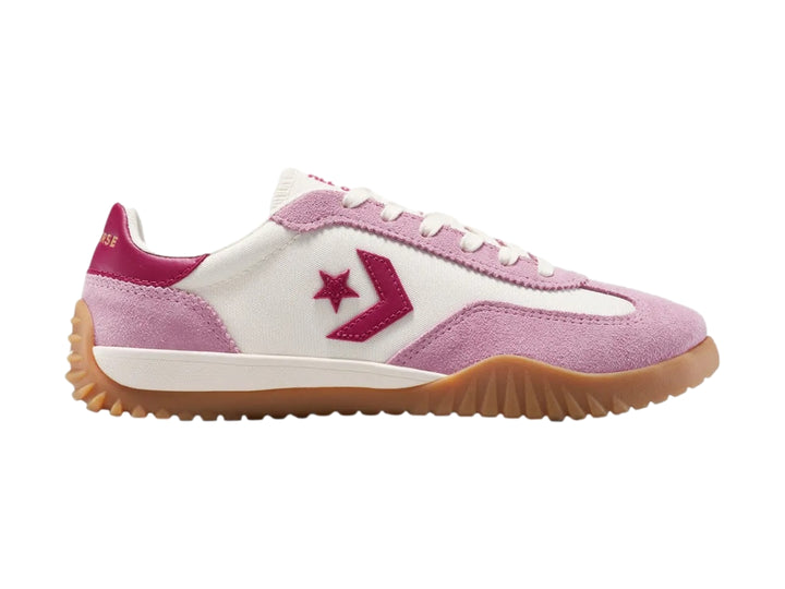Tenis Converse Run Star Trainer en colores rosa y blanco con suela color café.
