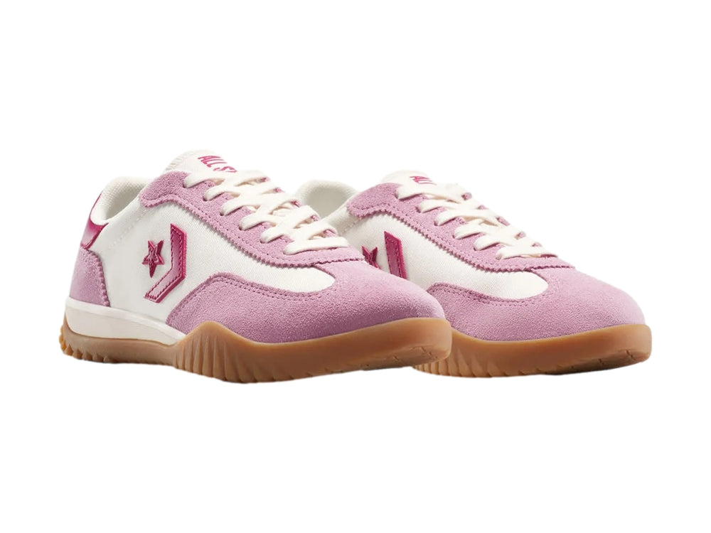 Tenis Converse Run Star Trainer en colores rosa y blanco con suela color café.