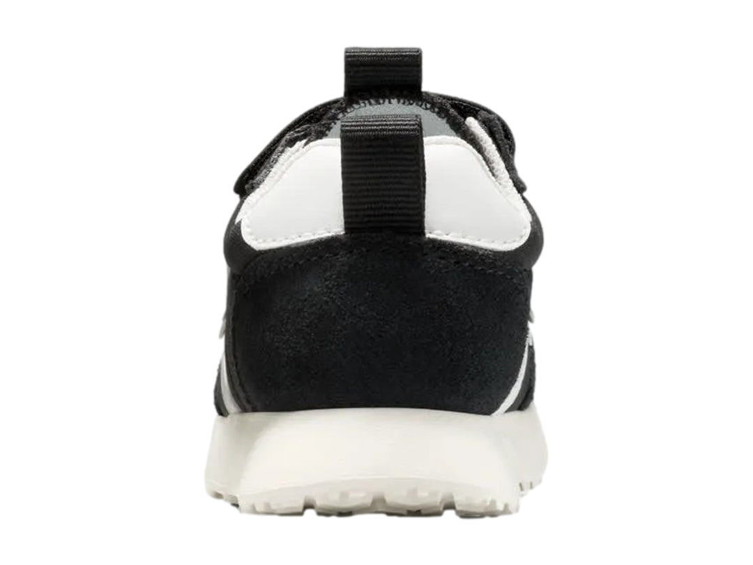 Tenis Converse Omega Trainer Easy-On color negro con suela blanca y cierre de velcro.