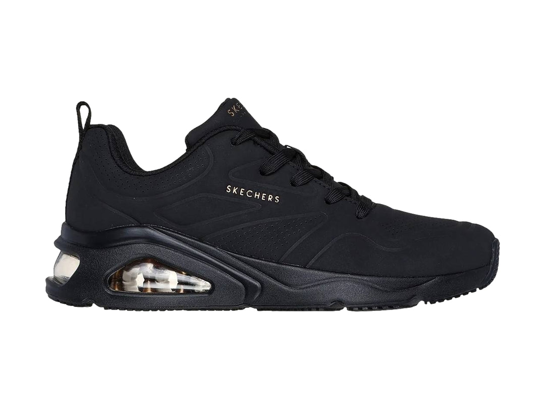 Tenis deportivos Skechers color negro con amortiguación de aire visible en el talón.