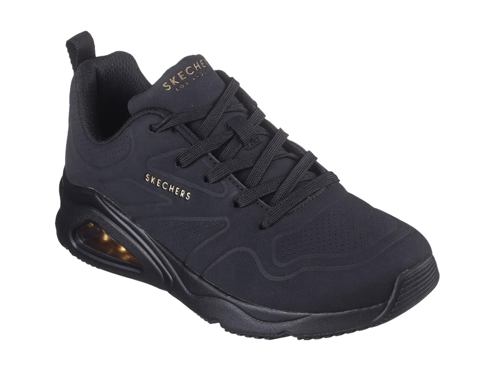 Tenis deportivos Skechers color negro con amortiguación de aire visible en el talón.