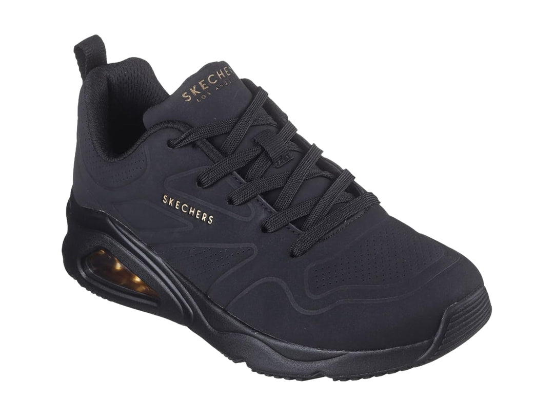 Tenis deportivos Skechers color negro con amortiguación de aire visible en el talón.