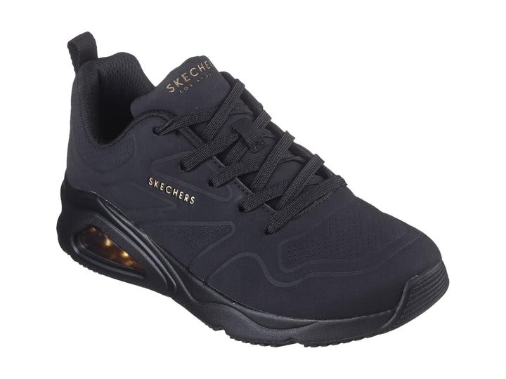 Tenis deportivos Skechers color negro con amortiguación de aire visible en el talón.