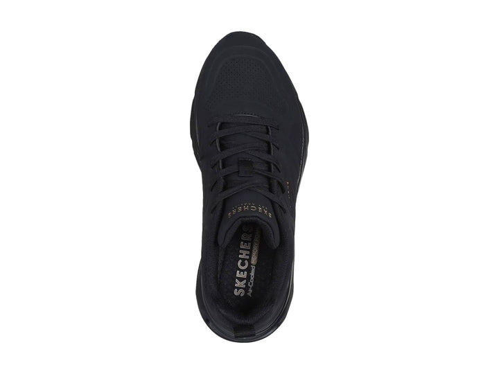 Tenis deportivos Skechers color negro con amortiguación de aire visible en el talón.