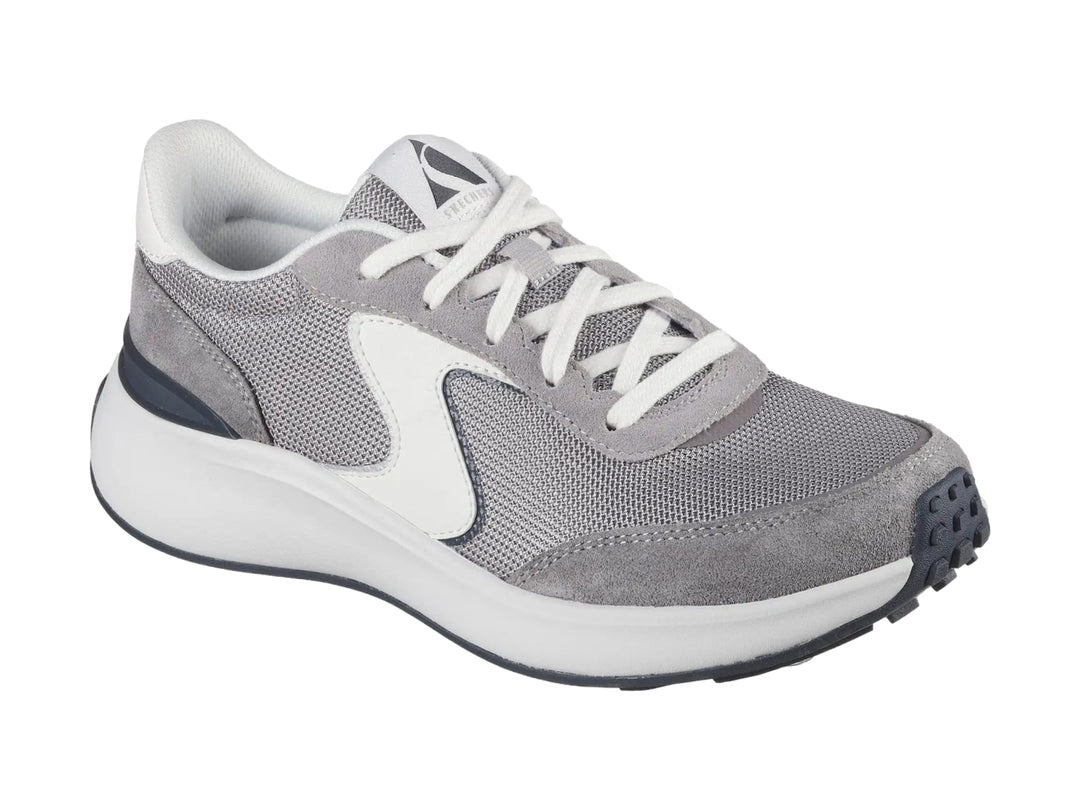 Tenis Skechers modelo Blvd en color gris con detalles blancos y suela blanca gruesa.