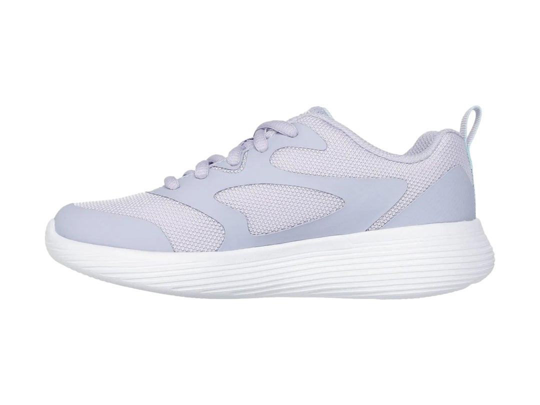 Tenis deportivos Skechers color lila con suela blanca.