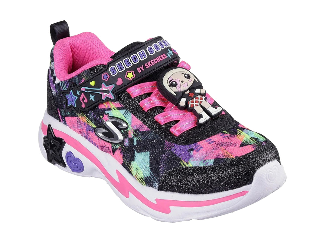 Tenis Skechers infantiles color negro con detalles brillantes multicolores y suela blanca con rosa.