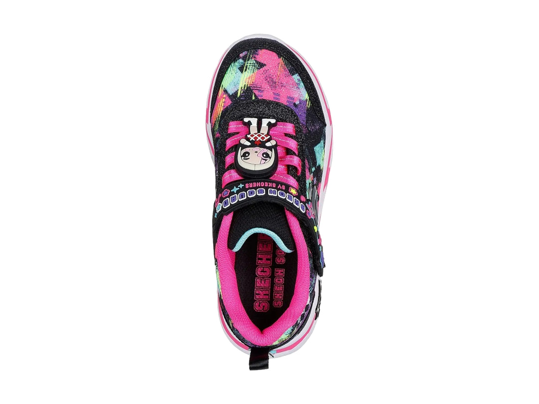 Tenis Skechers infantiles color negro con detalles brillantes multicolores y suela blanca con rosa.