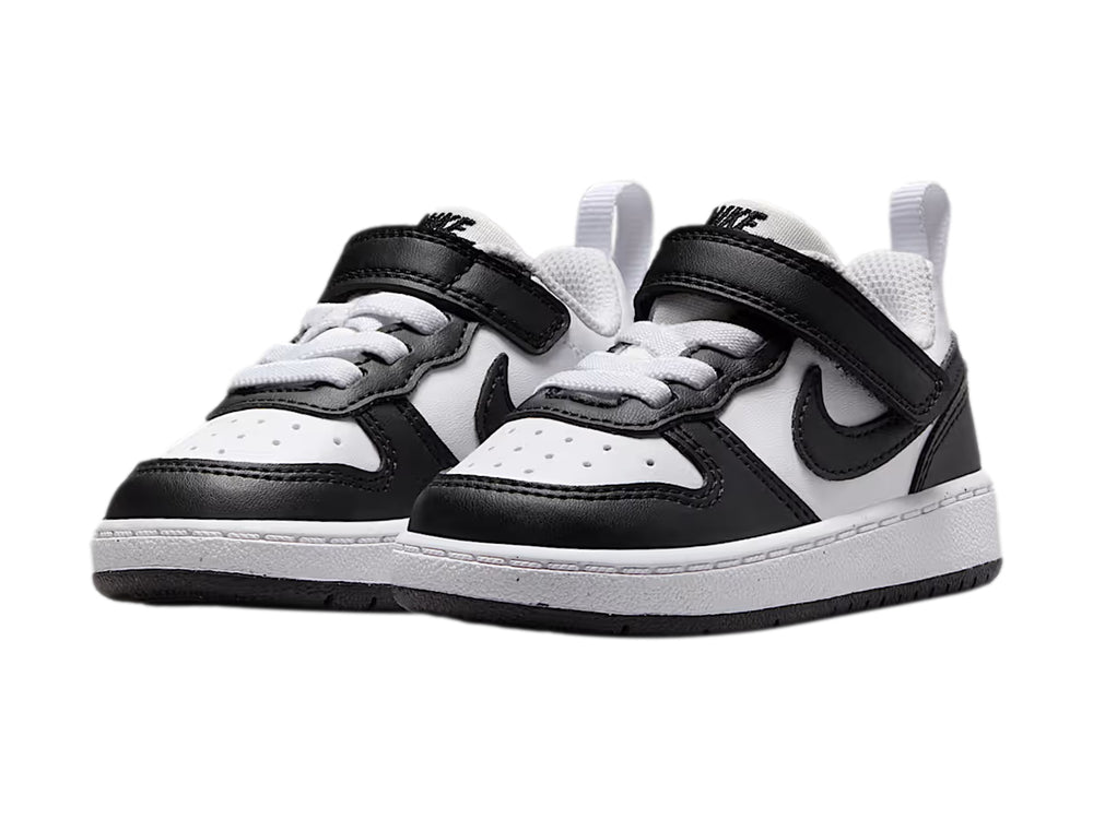 Tenis Nike Court Borough Low Recraft para bebé en colores blanco y negro con cierre de velcro.