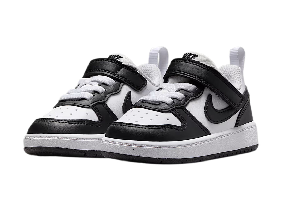 Tenis Nike Court Borough Low Recraft para bebé en colores blanco y negro con cierre de velcro.
