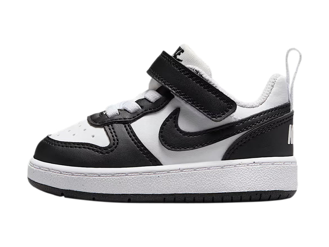 Tenis Nike Court Borough Low Recraft para bebé en colores blanco y negro con cierre de velcro.