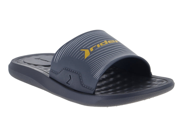 Sandalia slide infantil Rider en color gris oscuro con logo amarillo.