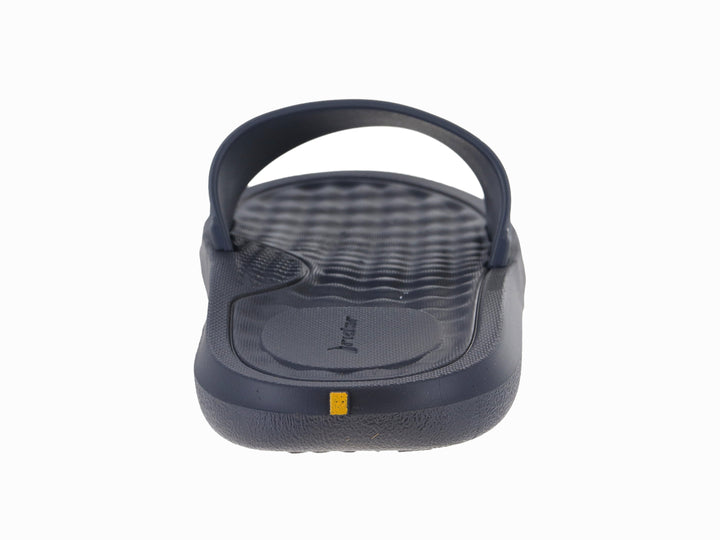Sandalia slide infantil Rider en color gris oscuro con logo amarillo.