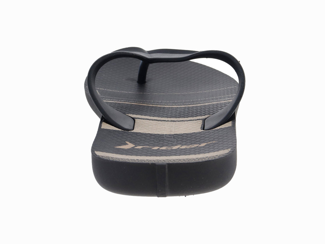 Sandalia Rider color negro con rayas beige, diseño urbano y casual.
