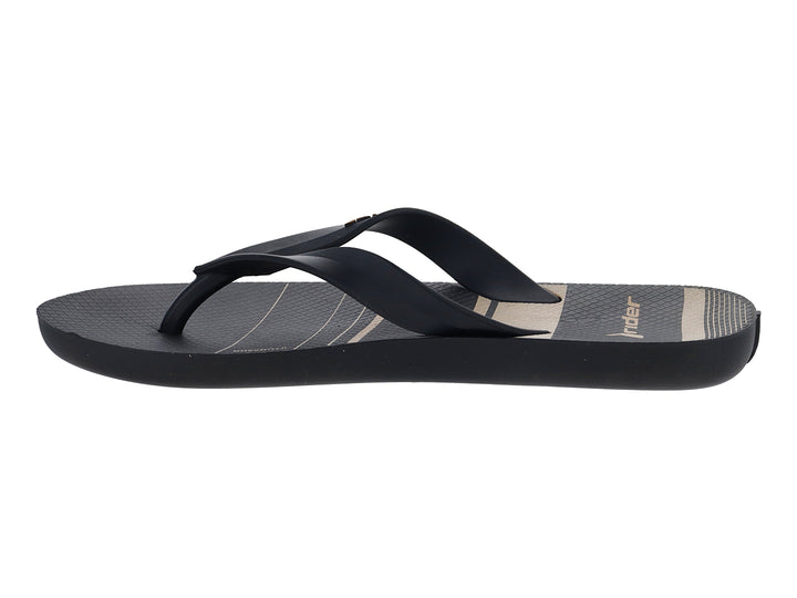 Sandalia Rider color negro con rayas beige, diseño urbano y casual.