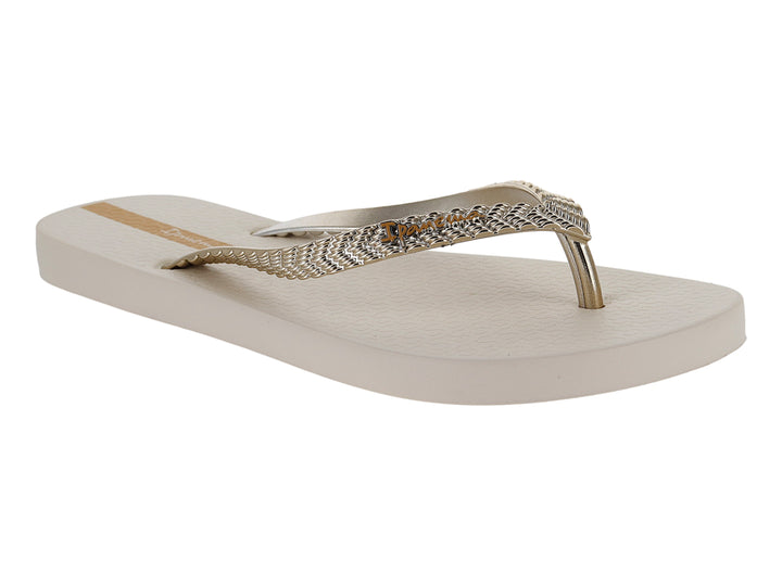 Sandalias de dedo Ipanema en color beige con tiras doradas brillantes.