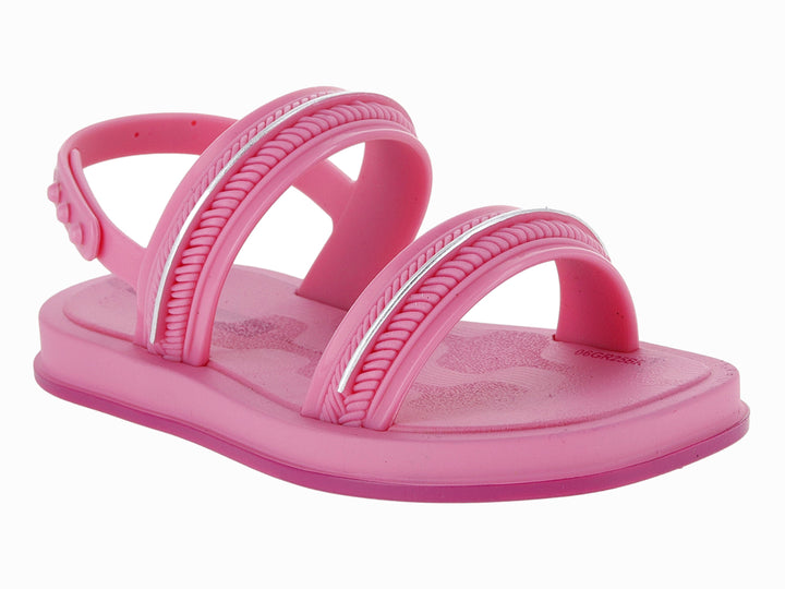 Sandalia infantil color rosa con detalles plateados brillantes y tiras ajustables.