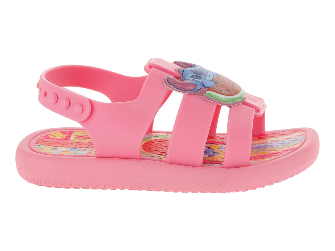 Sandalia rosa para bebé de la marca Ipanema Disney con correa ajustable y detalle decorativo frontal.