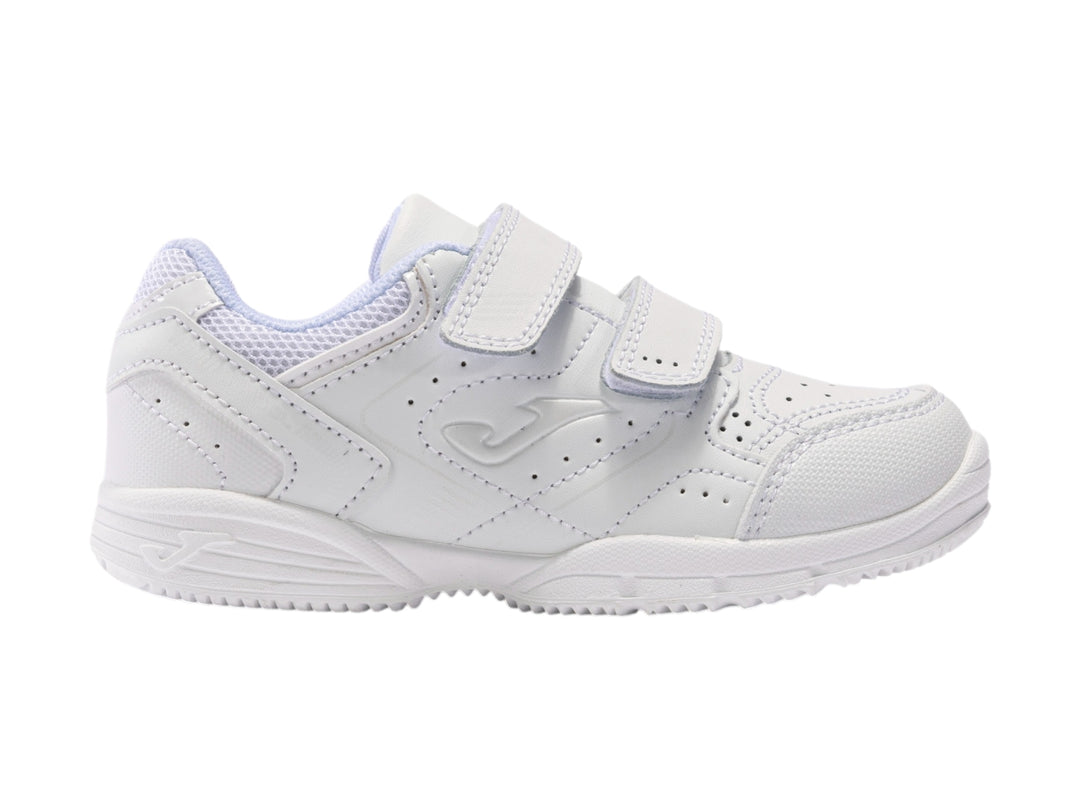 Tenis deportivos blancos Joma para niños con cierre de velcro y suela blanca.