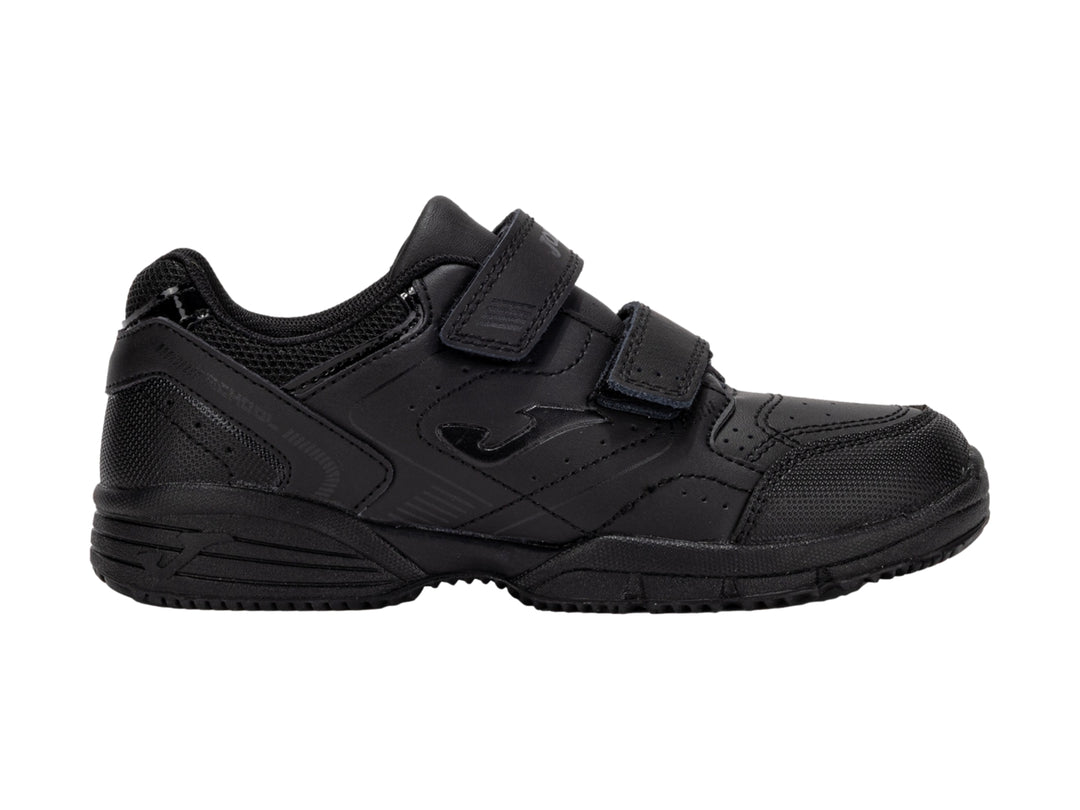 Zapato deportivo escolar Joma color negro con cierre de velcro para niño.