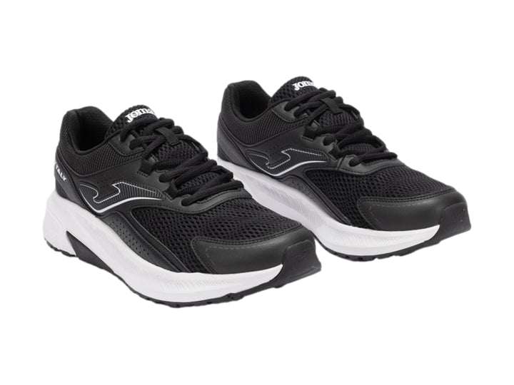 Tenis deportivos Joma Vitaly en color negro con suela blanca y detalles sintéticos.