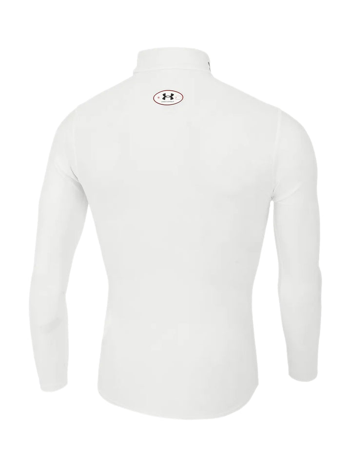 Camiseta de compresión blanca de manga larga y cuello mock marca Under Armour.