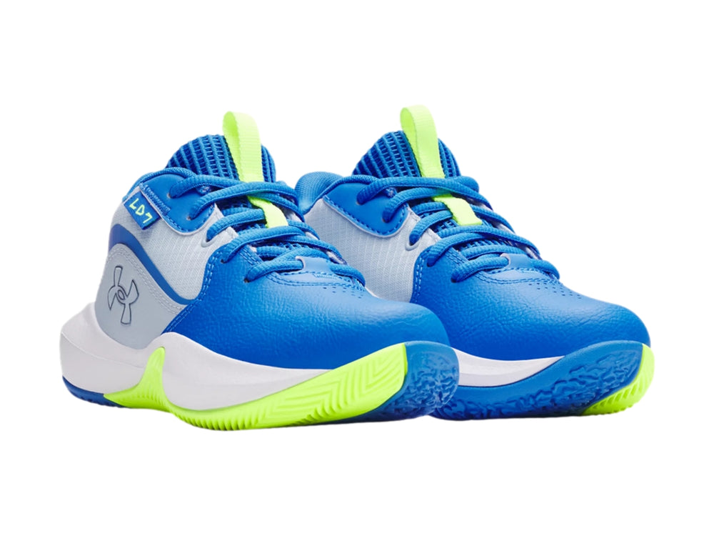 Tenis de baloncesto Under Armour Lockdown 7 en color azul con detalles en blanco y verde neón para niño.