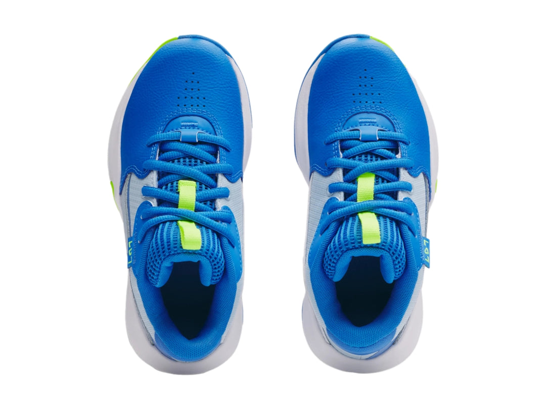 Tenis de baloncesto Under Armour Lockdown 7 en color azul con detalles en blanco y verde neón para niño.