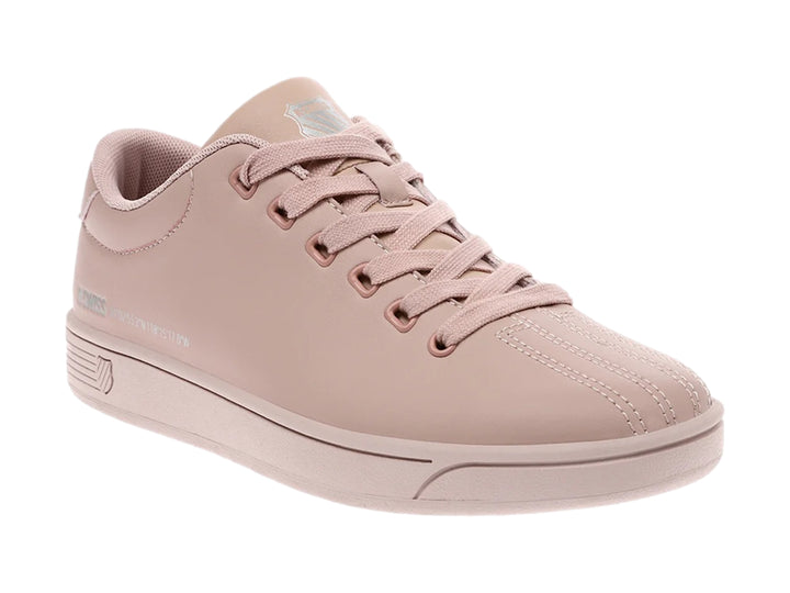 Tenis K-Swiss color rosa monocromático de corte bajo con agujetas.
