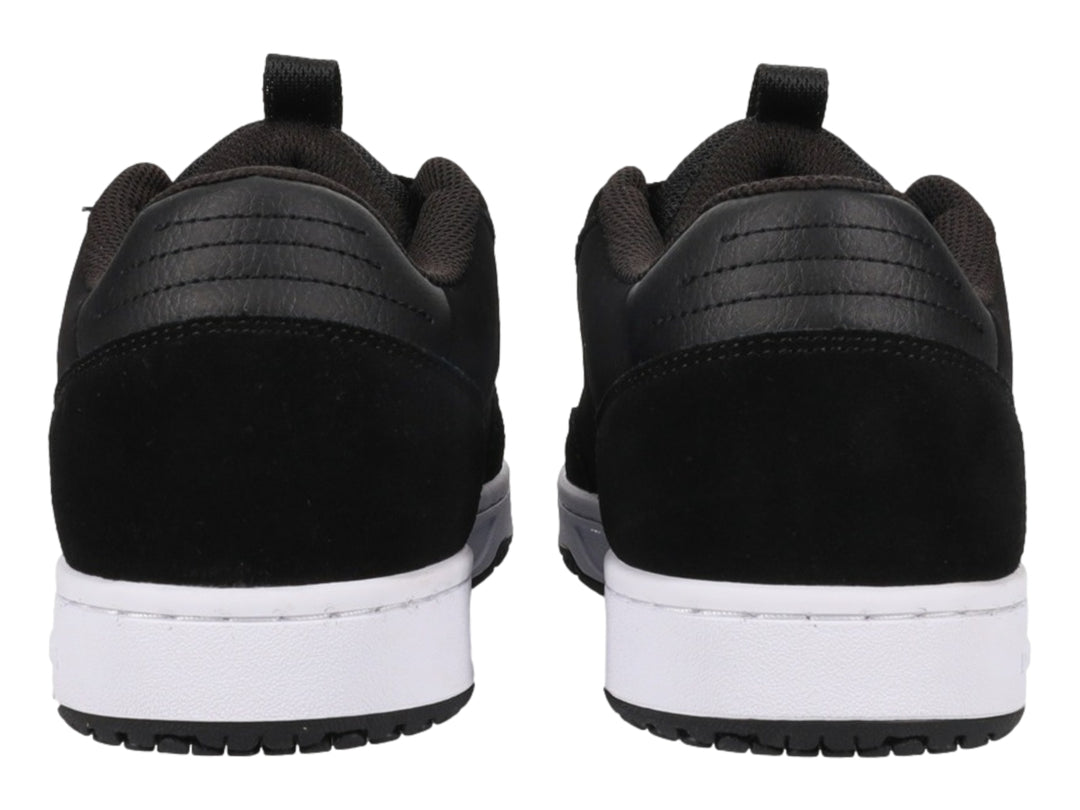 Tenis DC Shoes Astrix color negro con suela blanca y logotipo blanco en el lateral.
