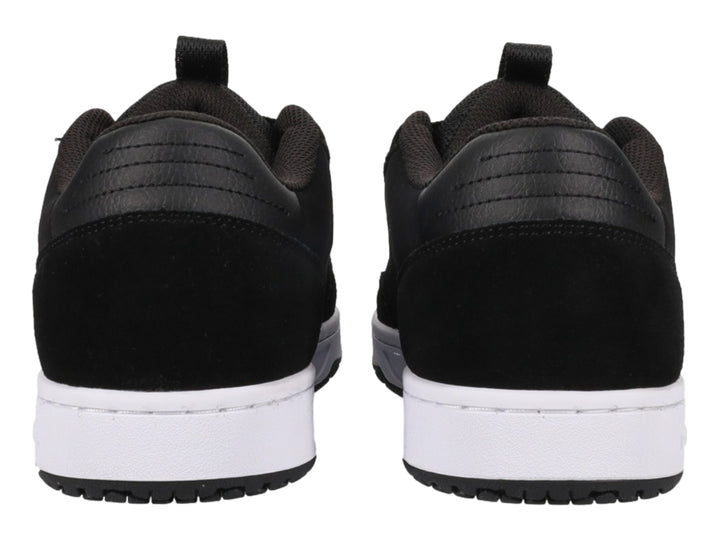 Tenis DC Shoes Astrix color negro con suela blanca y logotipo blanco en el lateral.